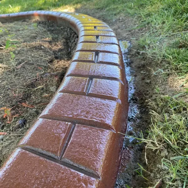 Permanent Exterior Solutions, LLC - Concrete Services, stamped concrete curbing, made to look like bricks - Belleville, IL & the Metro East